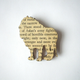 Illustration for article titled Brooches Made From Classic Books Let You Wear Your Favorite Words